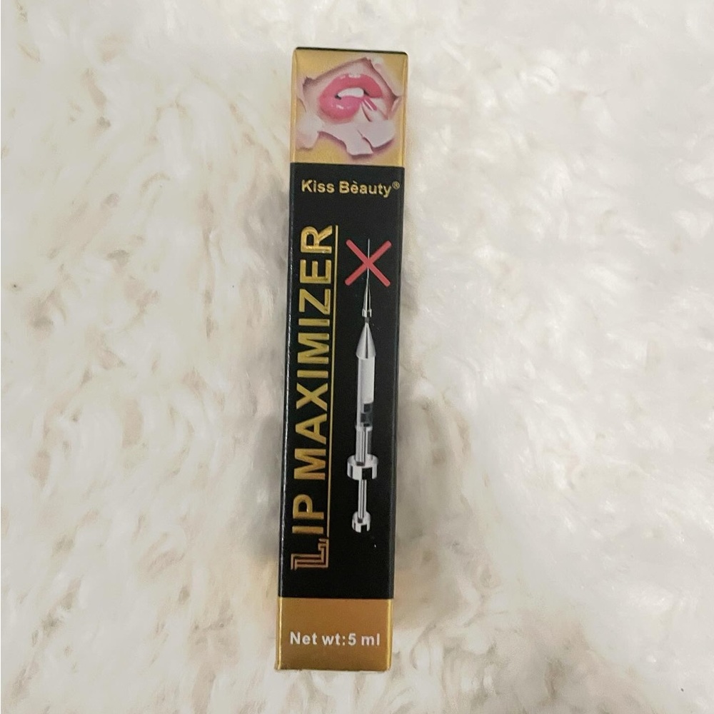 Kiss beauty plumping lip gloss.